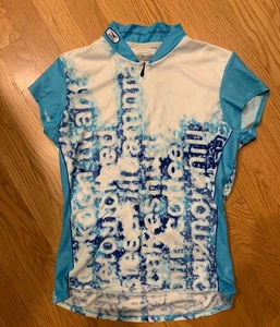 Jersey de ciclismo Sugar pequeño azul floral 1/4 cremallera manga corta bolsillos traseros - Imagen 1 de 4