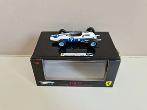 Hot Wheels 1/43 Ferrari 158 F1 J. Surtees - Gp Mexico 1964 - T6279 - Foto 1 di 8