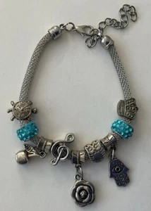 Charm bracelet - 7 Charms & Beautiful Aqua Rhinestone Spacers - Picture 1 of 4