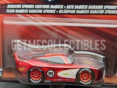 DISNEY PIXAR CARS RADIATOR SPRINGS LIGHTNING MCQUEEN METAL 2024 SAVE 6% GMC - Image 1 of 3