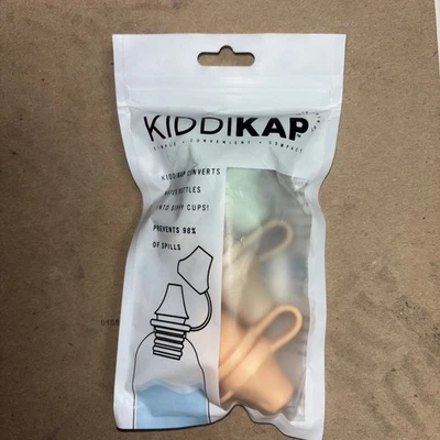 Paquete de 3 caños superiores de botella de silicona sin derrames KiddiKap (verde, arena y melocotón) Foto 1 de 2