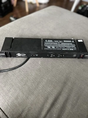 TRIPP LITE IBAR 12 ULTRA  SURGE SUPPRESSOR 12 OUTLETS #M31 - Image 1 of 4