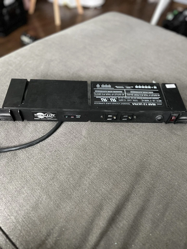 TRIPP LITE IBAR 12 ULTRA  SURGE SUPPRESSOR 12 OUTLETS #M31 - Image 1 of 4