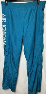 Vintage Nike Air Jordan warm up Pants snaps windbreaker Pants Jordan 4 Teal Blue - Picture 1 of 12