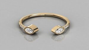 Cuff Style Wedding Band In 10K Yellow Gold With Bezel Set Shiny White Moissanite