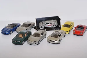 29 8x LOTTO AUTO FERRARI AUDI TOYOTA BMW 1:32 - 1:36 NEW RAY senza scatola originale - Foto 1 di 5