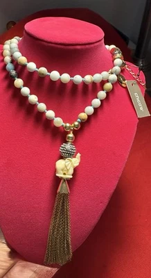 Ожерелье из камня шикос 40 дюймов с подвеской в виде слона и золотистыми кисточками - Изображение 1 из 4