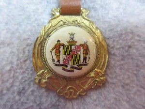 MARYLAND STATE SEAL Antique Vintage 2" WATCH FOB on strap - Picture 1 of 3