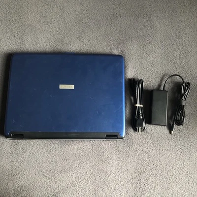 Toshiba Satellite A75-S206 Windows XP Laptop w/ Charger - NEEDS REPAIRS - Image 1 of 4