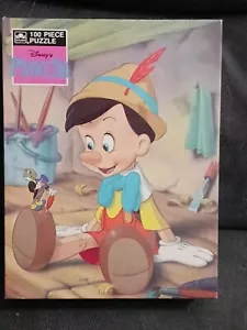 Vintage And Rare GOLDEN BOOKS DISNEY'S PINOCCHIO 100 PIECE PUZZLE, NEW, SEALED - Picture 1 of 17