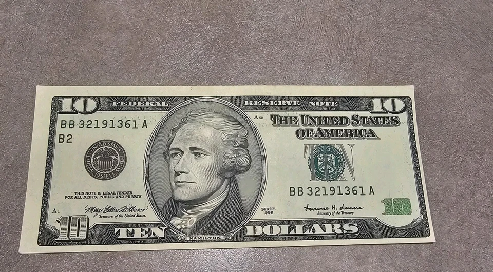 1999 TEN DOLLAR BILL MISALIGNED/MISCUT OFF-CENTER ERROR - Image 1 of 4