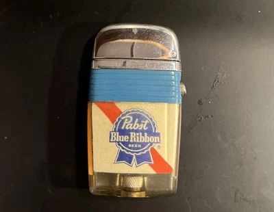 ENCENDEDOR SCRIPTO VU.. Años 60-70 "CERVEZA CINTA AZUL PABST" ¡Muy buen estado!! Foto 1 de 4