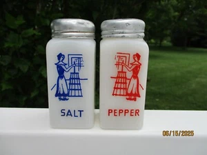 HAZEL-ATLAS BUTTER CHURNING LADIES SALT AND PEPPER SHAKERS - Picture 1 of 2