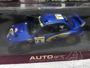AUTOart 1/18 Subaru Impreza WRC 99 Sammlermodell silberfarben getestet - Bild 1 von 7
