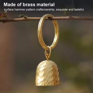 Campanellino portatile da esterno casa ultraleggero campeggio tenda ottone campanella EDC pendente - Foto 1 di 10