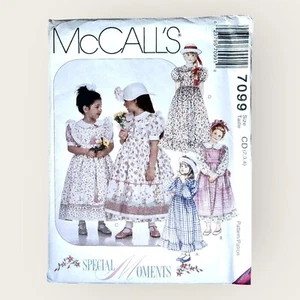 Vintage 1990s McCalls Sewing Pattern 7099 Girls Dress Pinafore Size 2-4 Uncut - Picture 1 of 2
