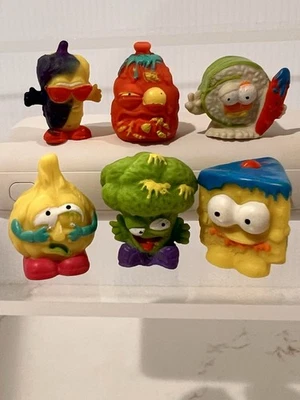 Lote 6 Figuras de Alce Raras Paquete de Basura Cacky Cake Cringe Chile Rollo Podrido Ajo Foto 1 de 4