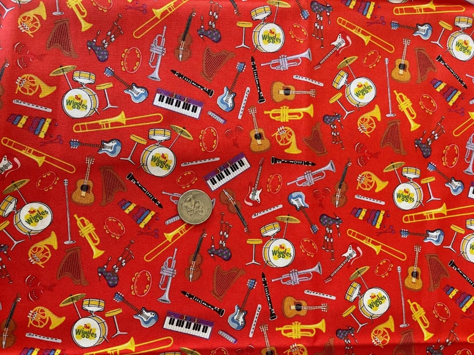THE WIGGLES CARTOON MUSIC INSTRUMENTS RED 100% COTTON FABRIC C8543 RILEY BLAKE - Image 1 of 1