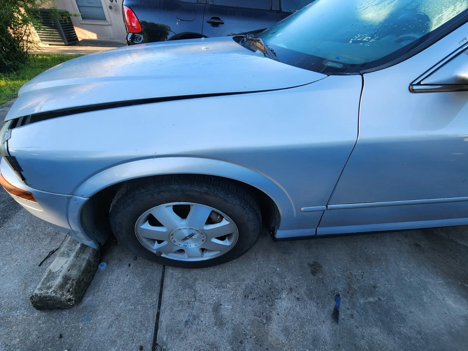 Guardabarros izquierdo Lincoln LS 2000 2001 2002 2003 2004 2005 2006 PLATEADO Foto 1 de 1