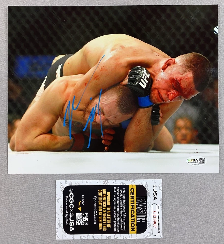 NATE DIAZ AUTOGRAPH 8x10 SUBMISSION ACTION PHOTO UFC/MMA vs McGREGOR JSA CI33907 - Image 1 of 1