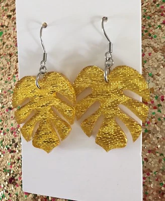 Monstera Leaf Earrings Glittery Gold Fabric Look Acrylic, Surgical Hooks, Leaves - image 1 of 3