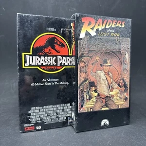 Raiders of the Lost Ark - Jurassic Park - VHS w/ Watermark Lot of 2 - Sealed - Picture 1 of 10