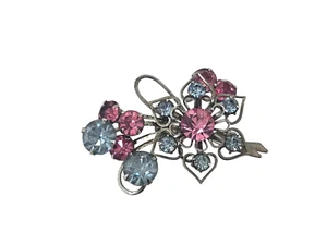 Broche floral vintage tono plata con pedrería rosa y azul - Imagen 1 de 4