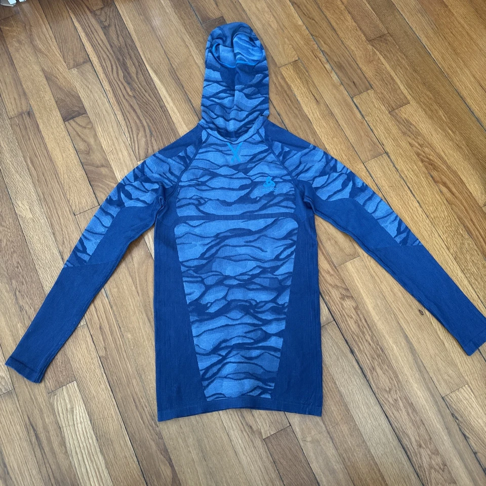 Top con capucha Odlo Blackcomb capa base azul manga larga para mujer con máscara facial talla S Foto 1 de 4