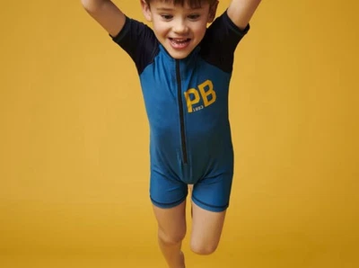 Traje de baño con protección contra erupciones Petit Bateau para niños Ropa de playa Traje de salto con protección UV Talla 5 Foto 1 de 4