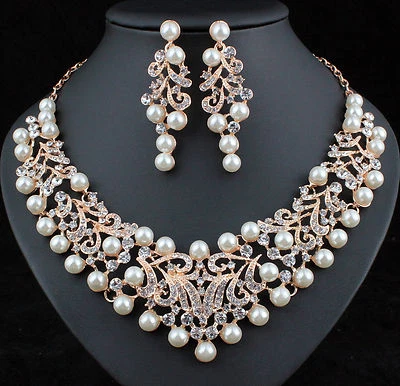 Conjunto de aretes con pechera de diamantes de imitación austriacos blancos de vid N922g Foto 1 de 4