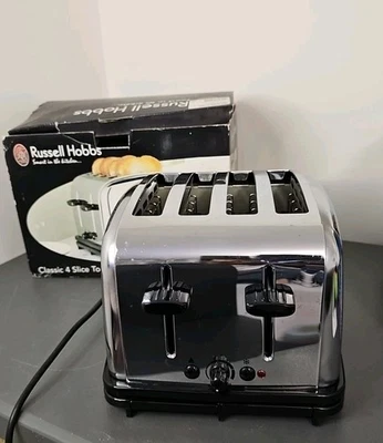 Russell Hobbs Adventure 4 Slice Toaster Stainless Steel .Box is rough - Image 1 of 4