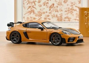 1:18 Porsche 718 Cayman GT4 RS Weissach 2023 -- Bahama Yellow -- Norev - Picture 1 of 7