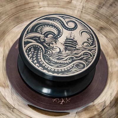 Vinyl record weight. The Kraken sea monster engraved aluminum turntable weight. - Image 1 of 4