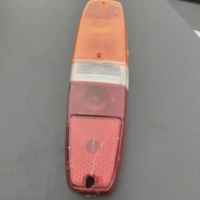 1969 Volvo 145 DRIVER/LEFT Tail Light Lens **HELLA ORIGINAL--AS REMOVED** - Image 1 of 4