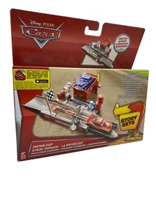 Disney Pixar Cars - Deluxe Story Set - T Piston Cup - New - 1.55 Scale - Picture 1 of 5