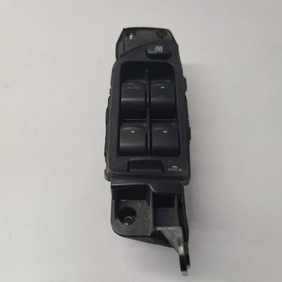 Interruptor de puerta y cerradura delantera del conductor Subaru Legacy 2005-09  Foto 1 de 4