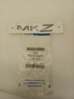 Lincoln MKZ Placa de identificación trasera cromada "MKZ" emblema OEM nuevo 7H6Z-5442528-B Foto 1 de 3