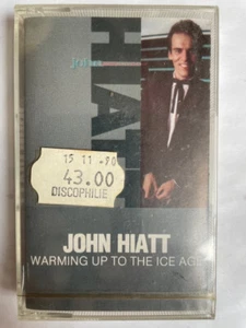 John Hiatt – Warming Up To The Ice neuve sous blister CASSETTE AUDIO TAPE C100 - Imagen 1 de 1