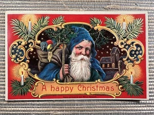 Frohe Weihnachten Weihnachtsmann blau Gewand Kapuze Spielzeug Postkarte Heymann 1912 Germany - Bild 1 von 3
