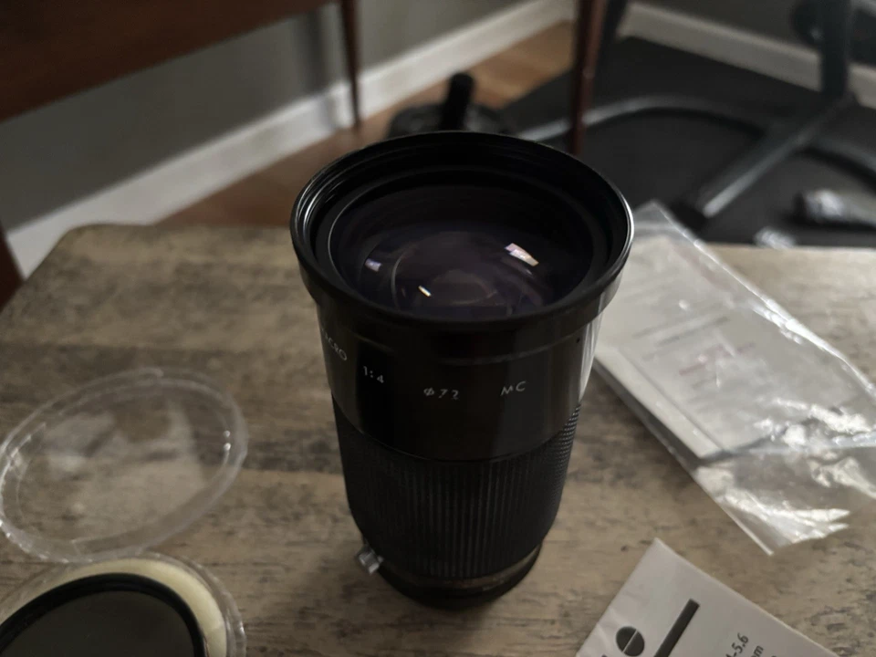 Lente de zoom macro telefoto Kiron 28-210mm f/4-5.6 - Imagem 1 de 4