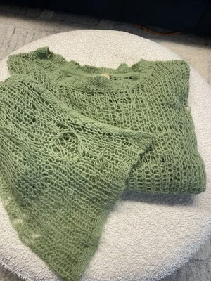 Suéter tejido abierto envejecido verde manzana/mar marca blanca Wildfox.  Foto 1 de 4
