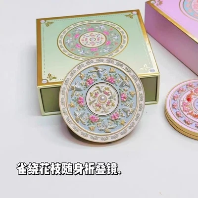 Beijing cultural y creativo pájaro envuelto rama de flores plegable espejo portátil Foto 1 de 4