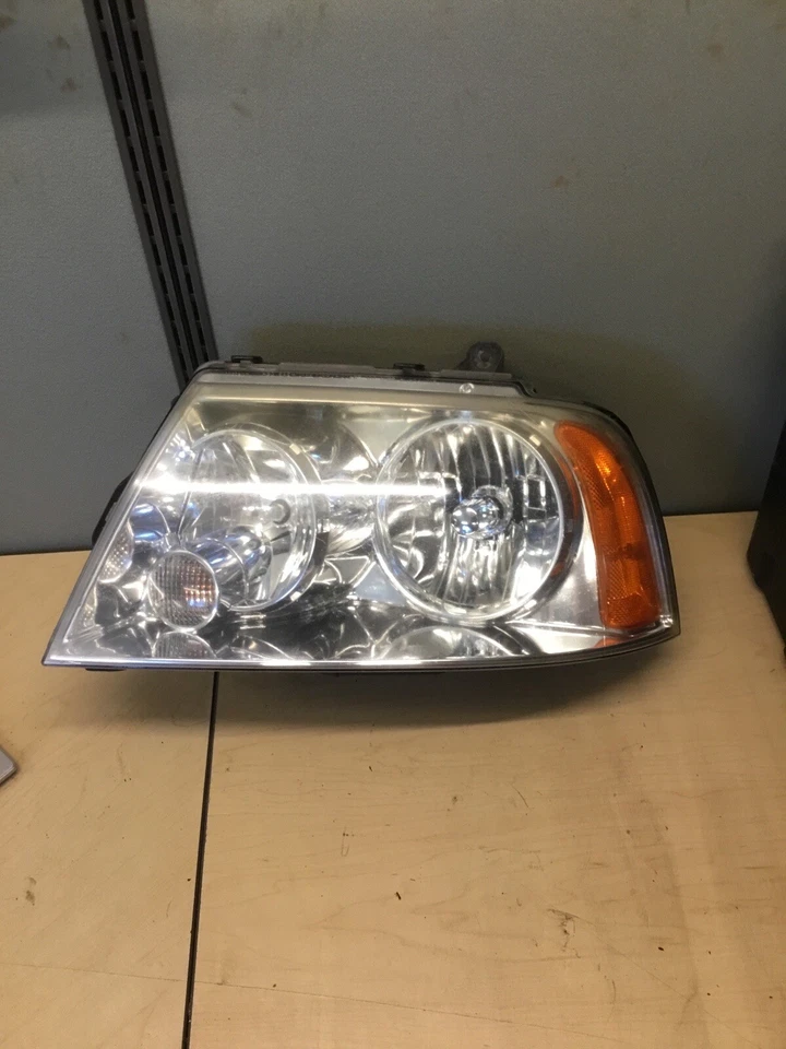 Conjunto de faros del lado del conductor izquierdo Lincoln Navigator 2003-2006 OEM Foto 1 de 1