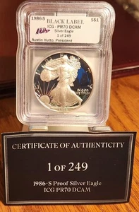 1986-S PR 70 DCAM PF 70 Silver Eagle BLACK Label COA 1 of 249 ICG HUTTO SIGNED - Picture 1 of 2
