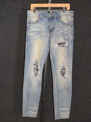 Pantalones de mezclilla AMIRI para hombre de cuero envejecido rasgados de lujo ajustados talla 34 Foto 1 de 4