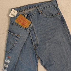 Jeans uomo Levi's 501 originali elasticizzati gamba dritta blu lavaggio chiaro 46x34 NUOVI - Foto 1 di 9