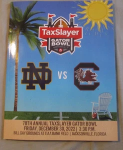 TAXSLAYER FOOTBALL PROGRAM 12-30-22 BOWL GAME NOTRE DAME CAROLINA GAMECOCKS - Picture 1 of 2