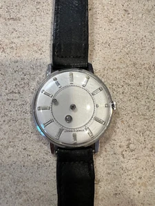 VINTAGE LOUVIC SWISS MADE WATCH MYSTERY DIAL EXCELLENT CONDITION - Picture 1 of 2