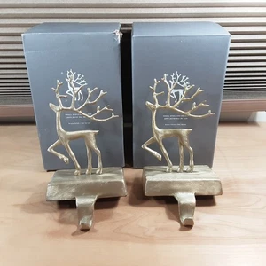 Juego de 2 soportes para medias de Navidad de oro de reno dorado pequeño Pottery Barn - Imagen 1 de 7