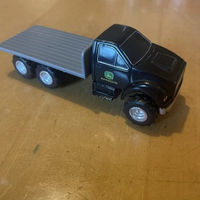 "Camión agrícola ERTL John Deere plataforma plana negro gris metal/plástico juguete fundido a presión 4,5""" Foto 1 de 4
